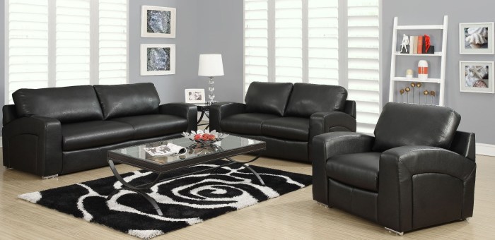 Wohnzimmer schwarze ledercouch